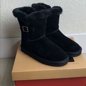 Black winter boots. Never worn.